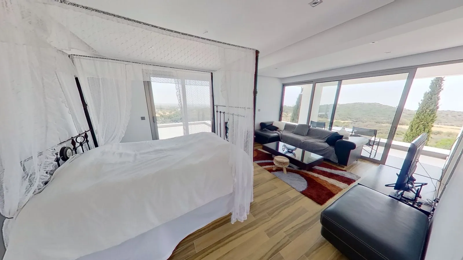 Bedroom and living area of the villa